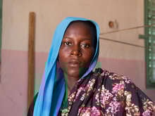 A women poses for a photo in a building in Chad.